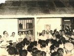 Meeting a favor de Chibas en Isla de Pinos donde se observa un letrero que dice Responderemos a Chibas